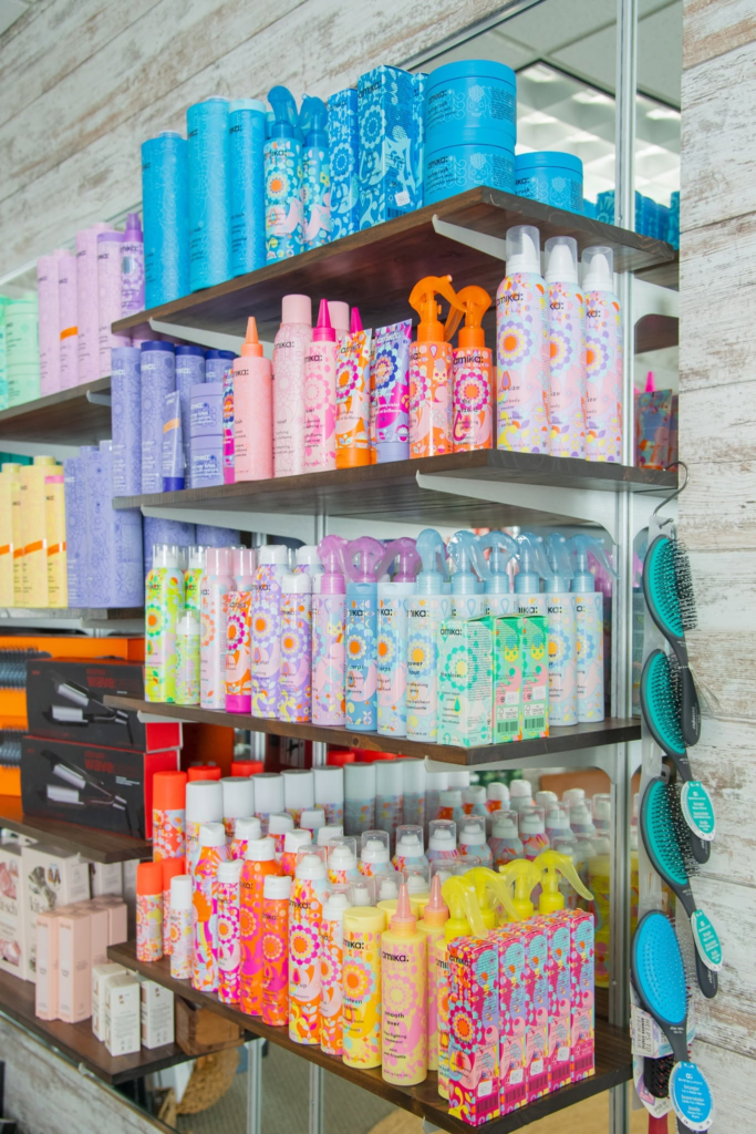 Shelves of colorful hair and beauty products at a local salon.