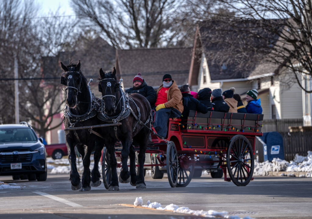 A horse-drawn carriage ride through snowy downtown Waupun.